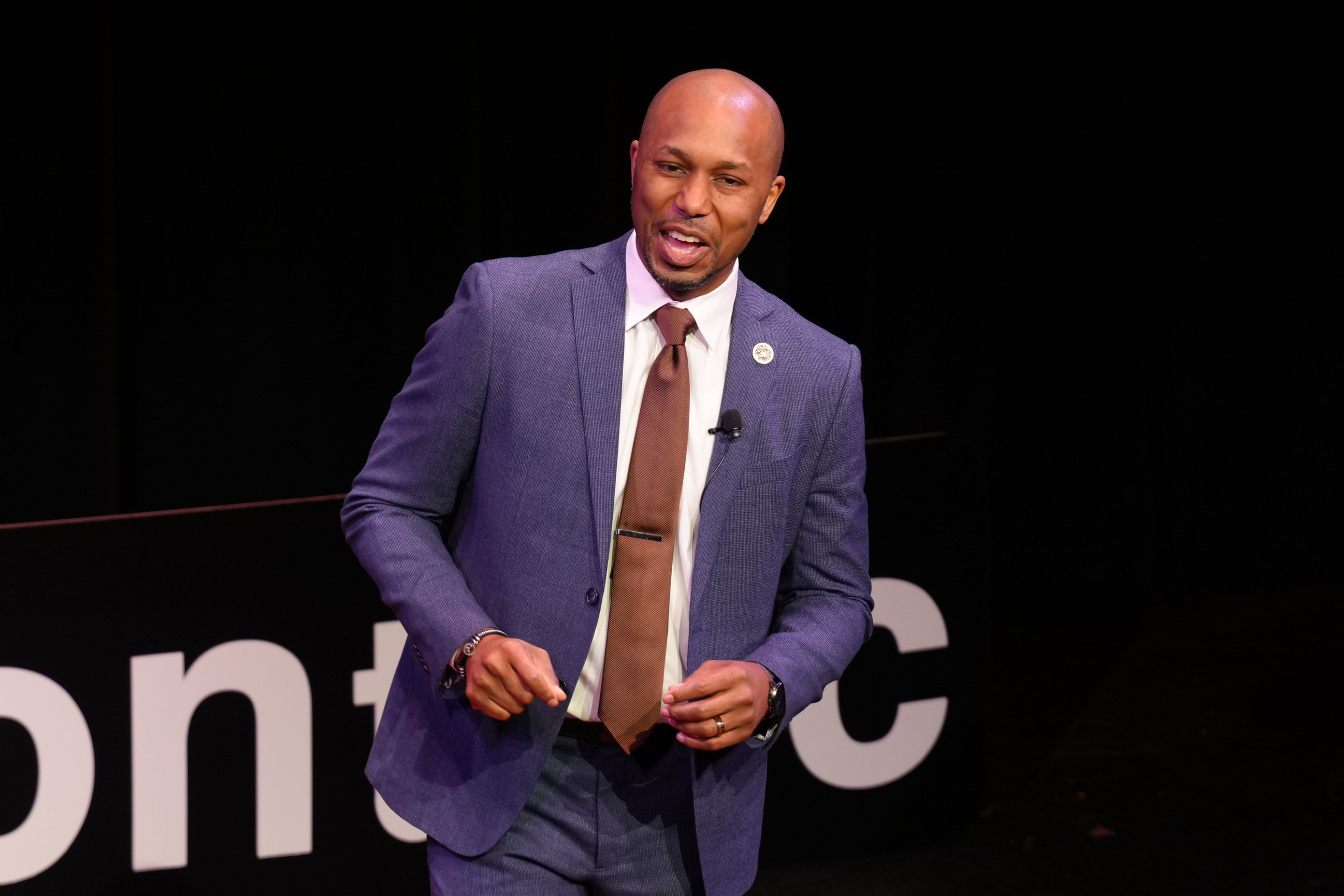 Marc D. Alexander delivering his TEDx talk Downward Growth