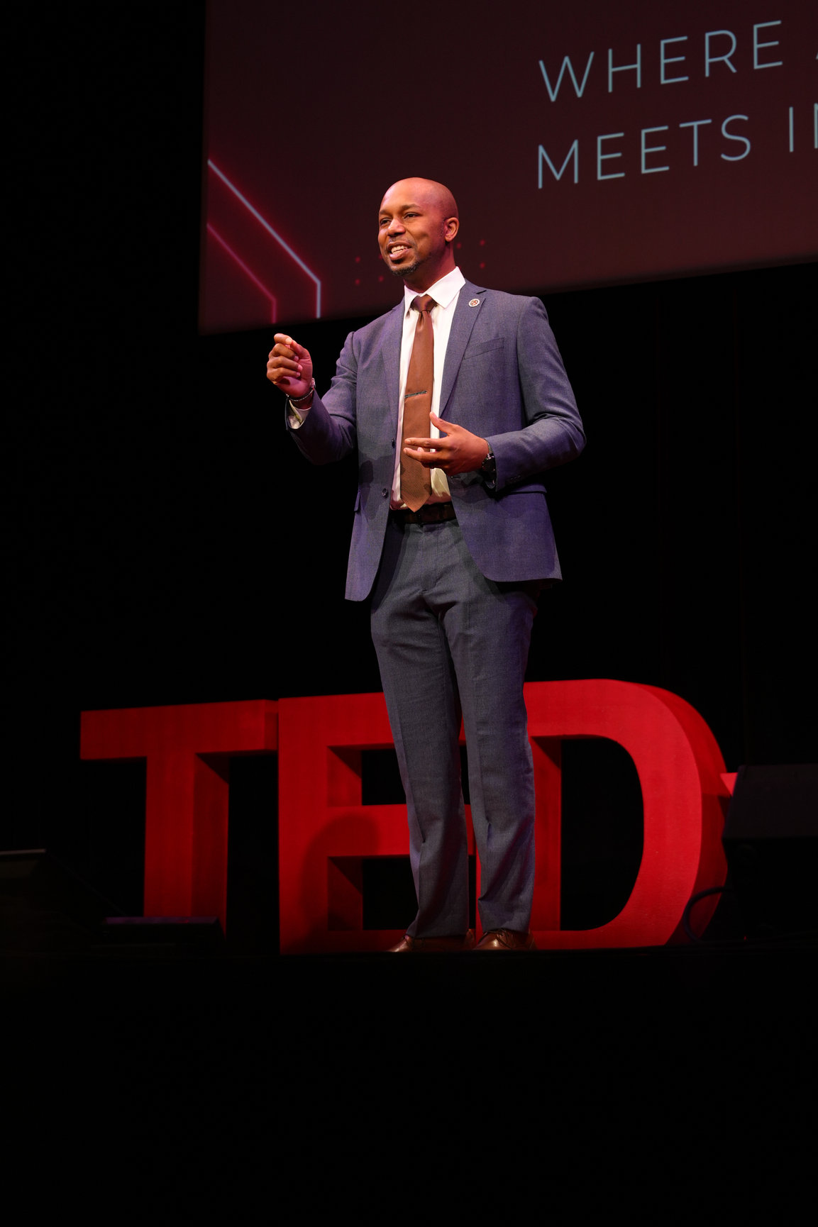 Marc D. Alexander on stage at TEDxPontiac